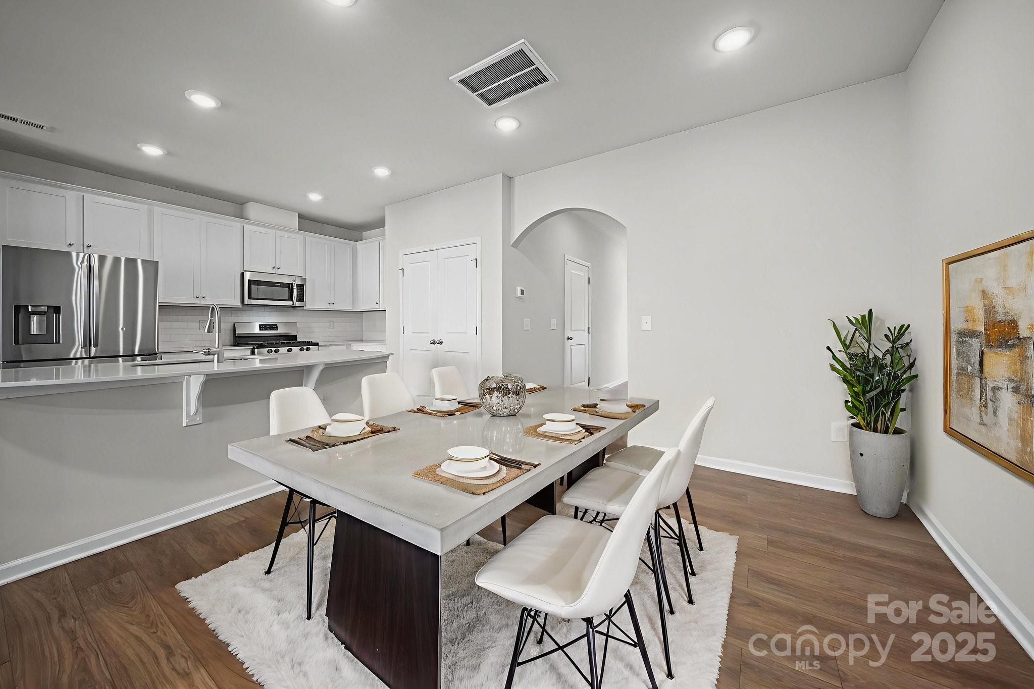 808 Gable Oak Lane Fort Mill, SC 29708 - Photo 7 of 41 a kitchen with a table and chairs in it