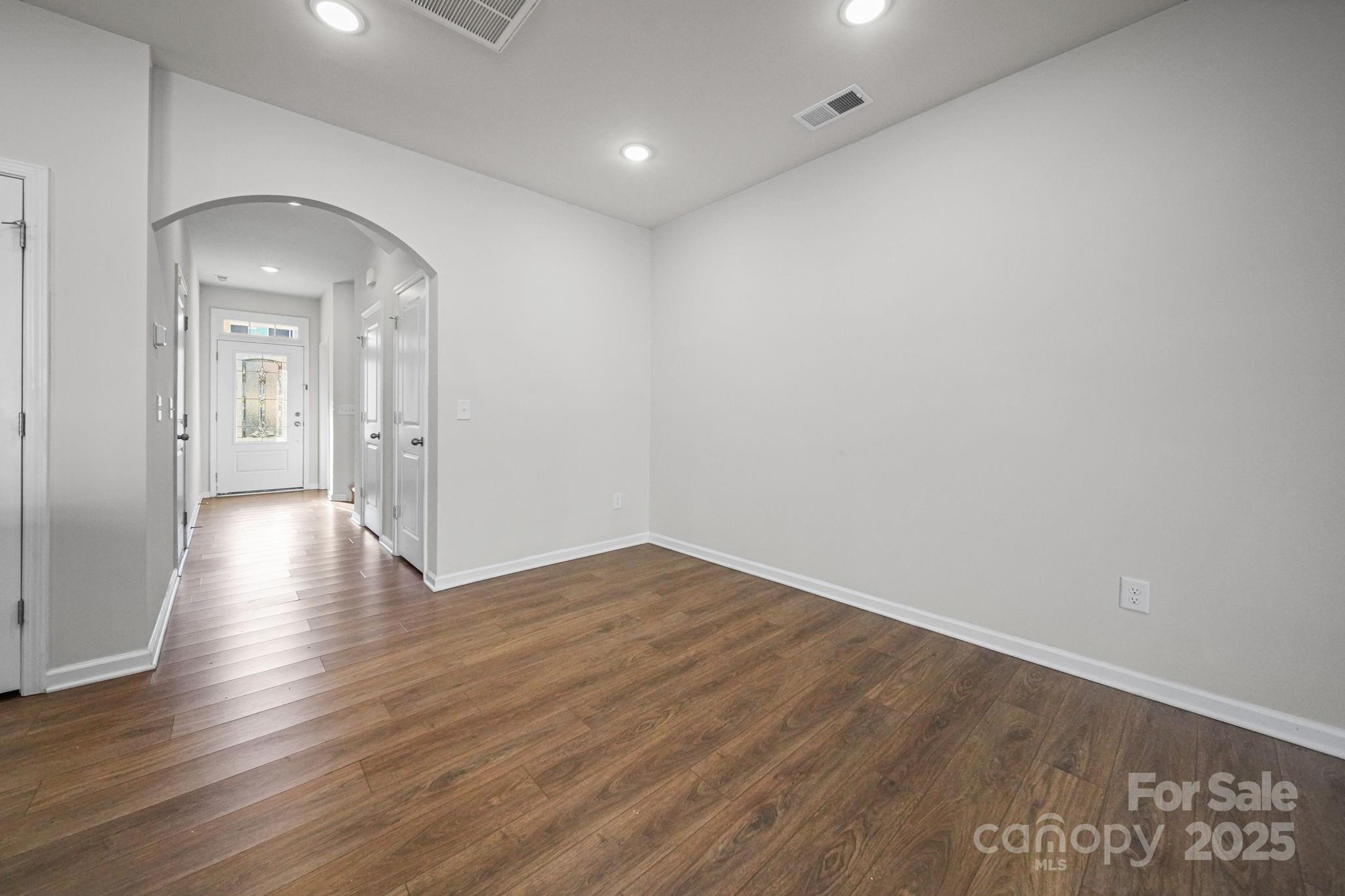 808 Gable Oak Lane Fort Mill, SC 29708 - Photo 9 of 41 wooden floor in an empty room with wooden floor