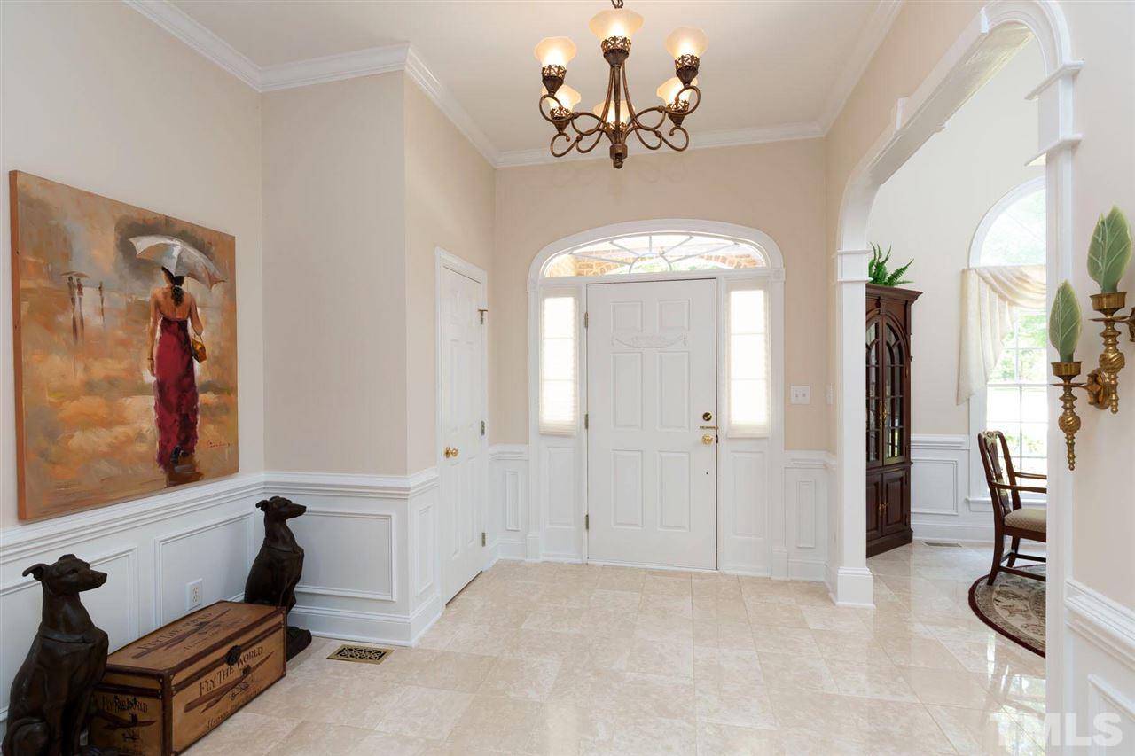 12613 Raven Ridge Road Raleigh, NC 27614 - Photo 5 of 29 a view of a room with gym equipment