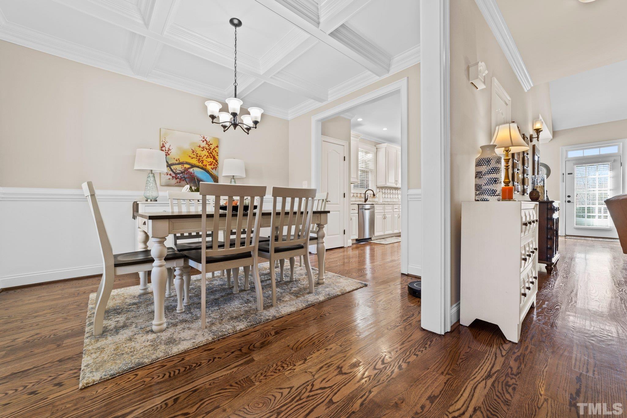 213 Serendipity Drive Haw River, NC 27258 - Photo 15 of 33 a view of a dining room with furniture and wooden floor