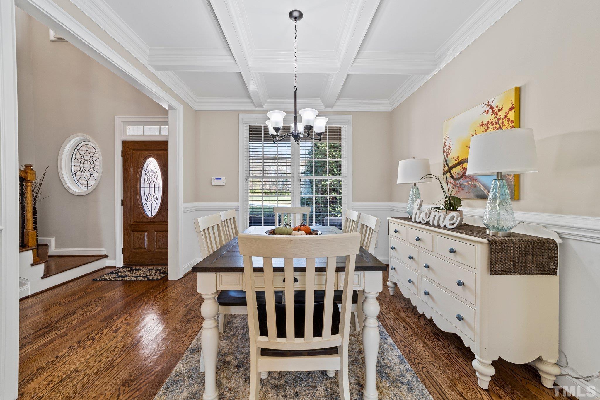 213 Serendipity Drive Haw River, NC 27258 - Photo 16 of 33 a view of a dining room with furniture window and wooden floor