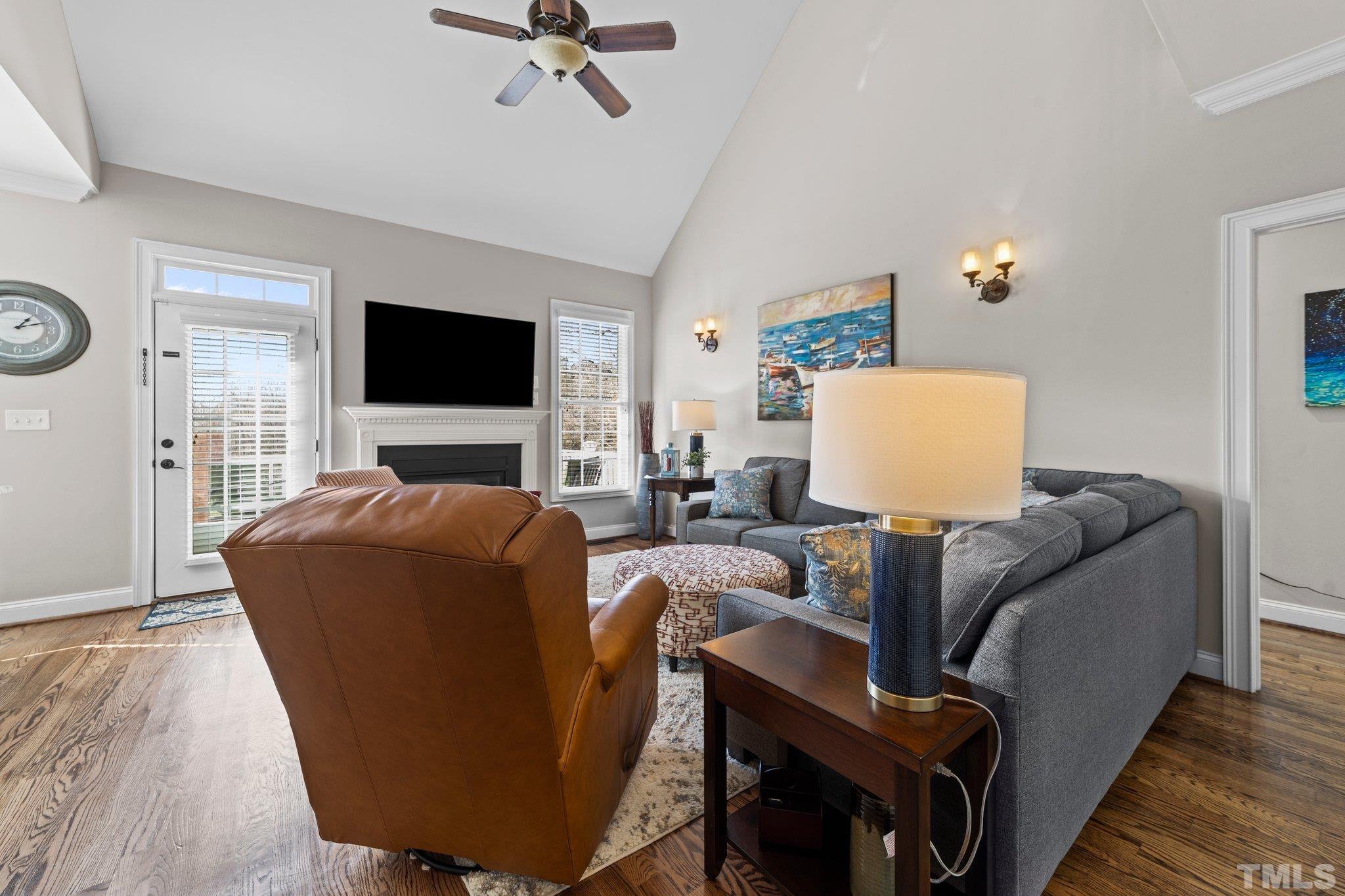 213 Serendipity Drive Haw River, NC 27258 - Photo 18 of 33 a living room with furniture and a flat screen tv