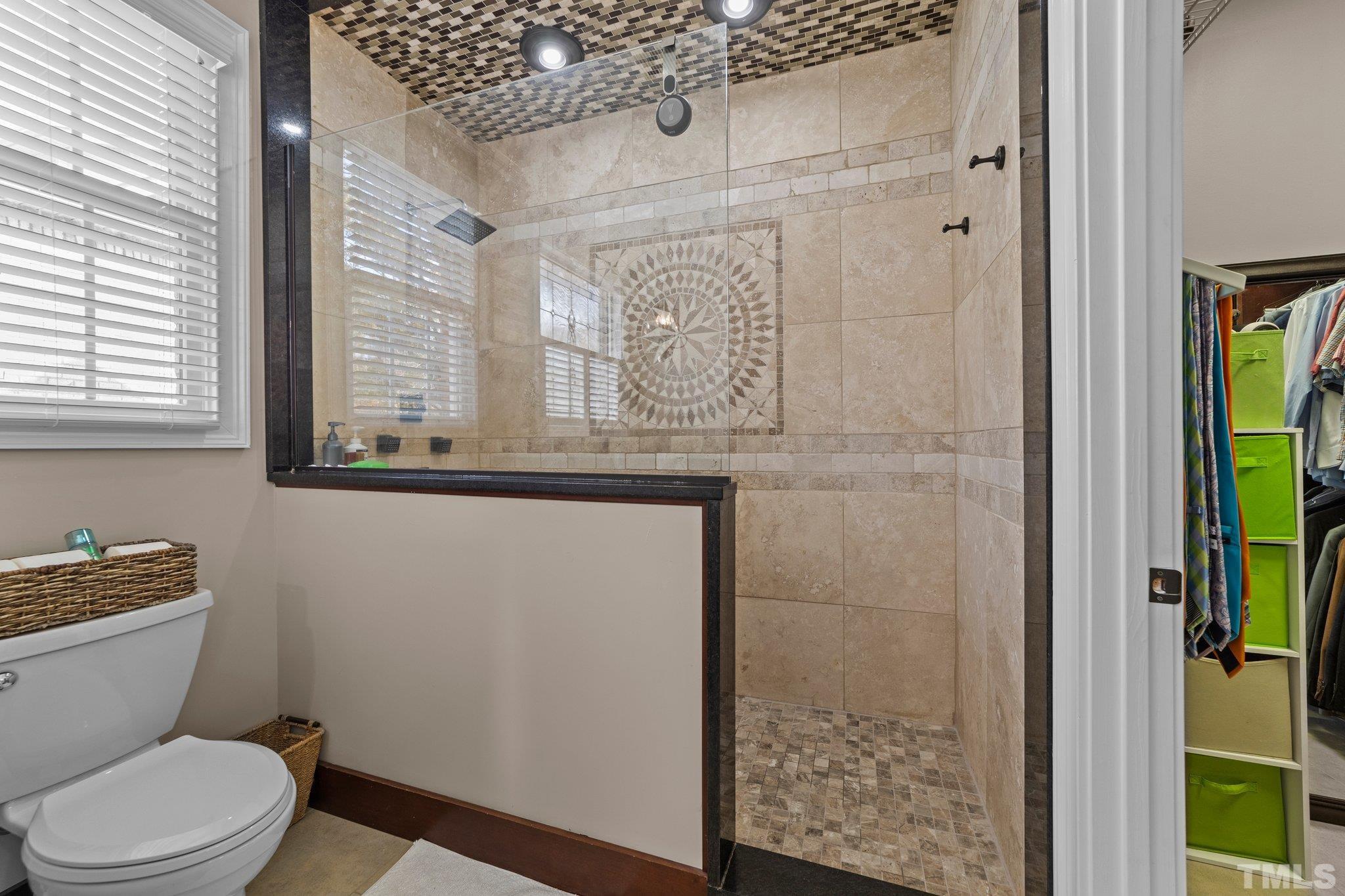 213 Serendipity Drive Haw River, NC 27258 - Photo 26 of 33 a bathroom with a toilet and a shower