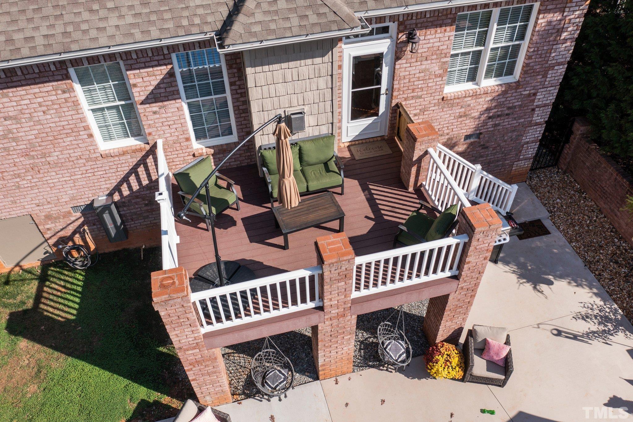 213 Serendipity Drive Haw River, NC 27258 - Photo 7 of 33 front view of a house with a deck