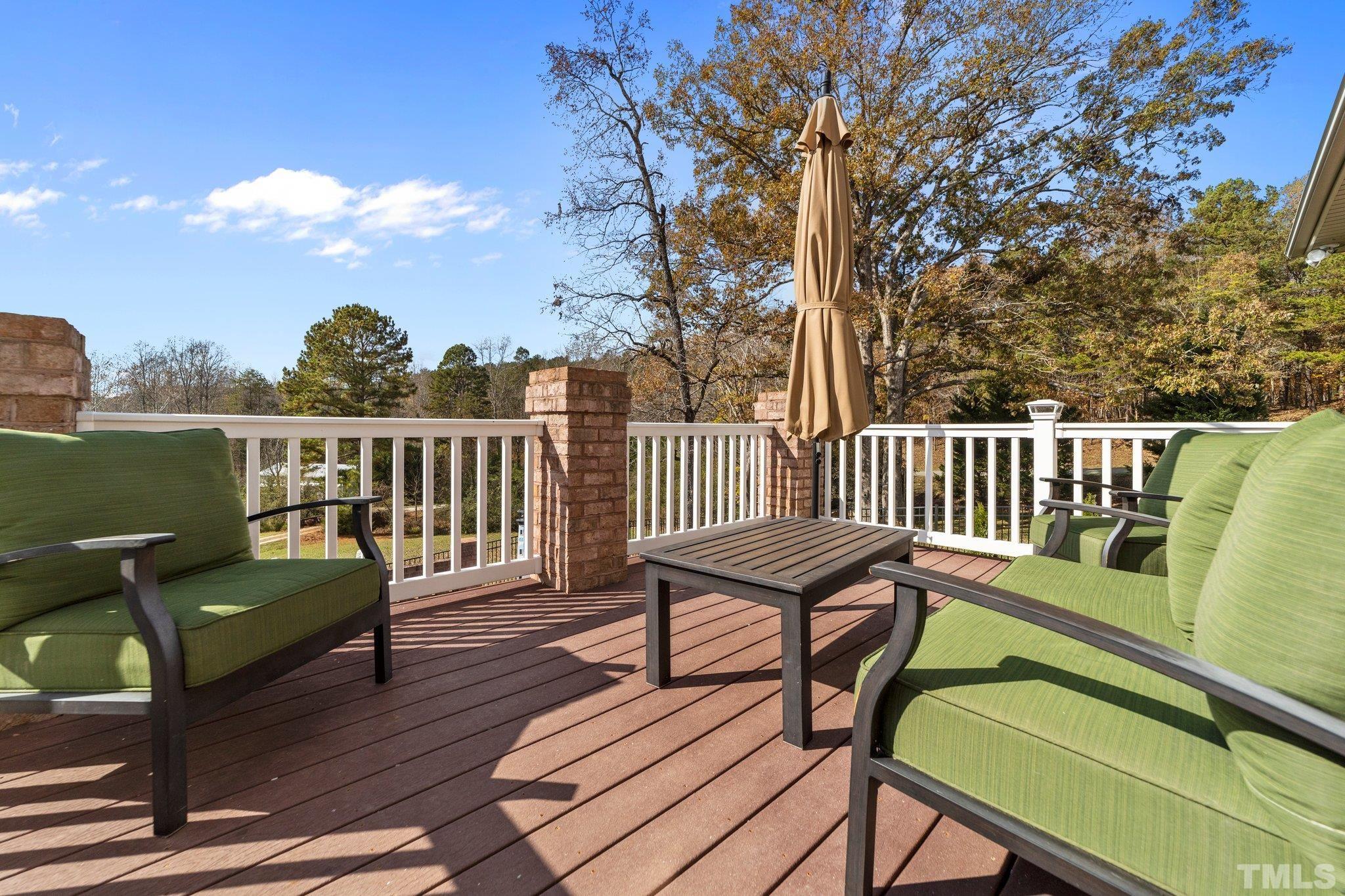 213 Serendipity Drive Haw River, NC 27258 - Photo 8 of 33 a view of a chairs in wooden deck
