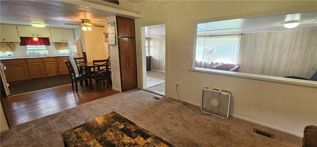 3403 Ellwood Road New Castle, PA 16101 - Photo 5 of 21 a view of a living room and dining room
