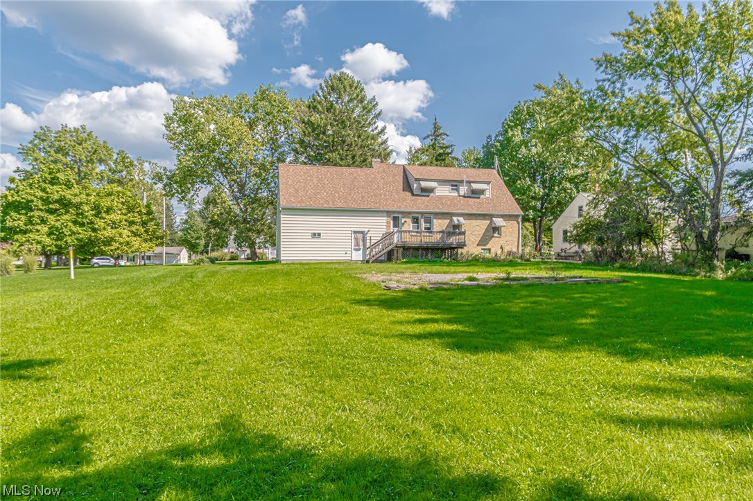 8358 Ridge Road North Royalton, OH 44133 - Photo 4 of 25 View of yard featuring a deck