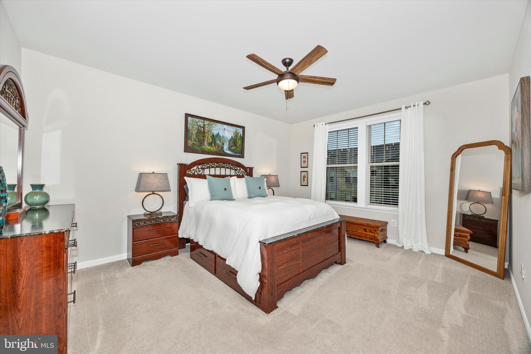 1817 Bird Run Frederick, MD 21702 - Photo 13 of 31 a bedroom with a bed lamp closet and window