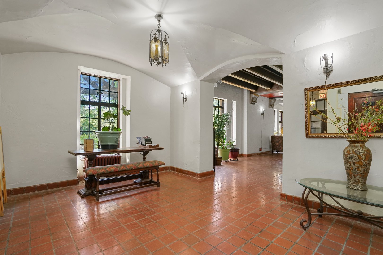 3017 East 78th Street, Unit 2B Chicago, IL 60649 - Photo 15 of 20 a living room with furniture and a window
