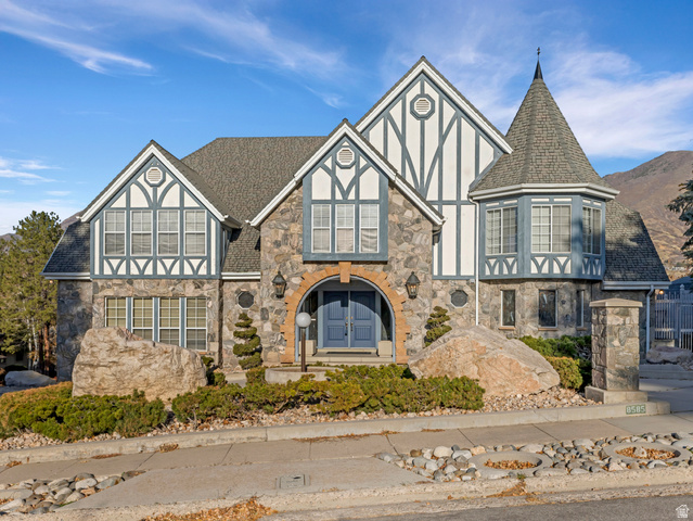 8585 Mount Majestic Road Sandy, UT 84093 - Photo 1 of 1 Tudor-style house with stone siding
