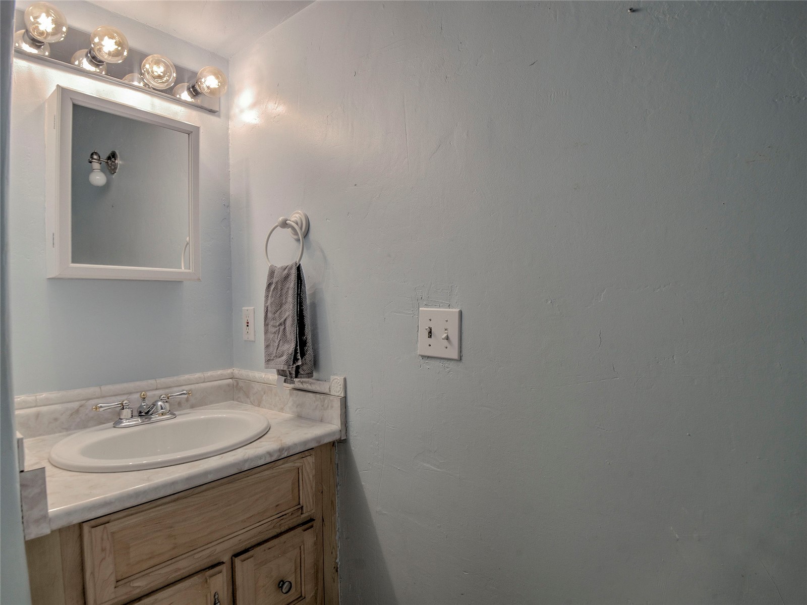 46 Singleton Road Alma, CO 80420 - Photo 28 of 50 a bathroom with a sink and a mirror