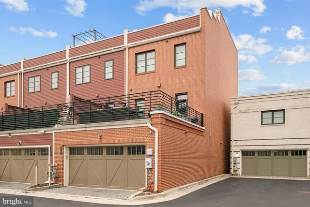 a front view of a house with a garage