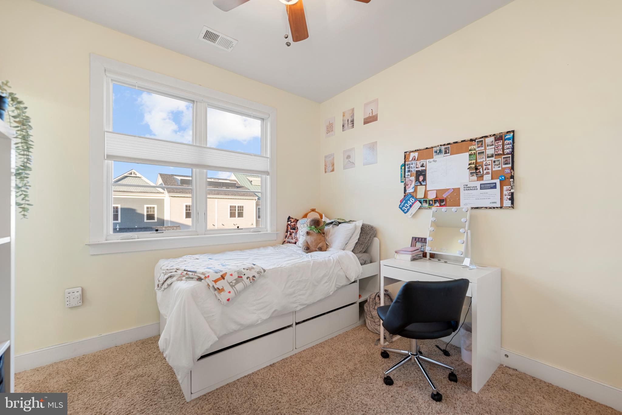 710 East Howell Avenue Alexandria, VA 22301 - Photo 19 of 43 a bedroom with a bed and a chair