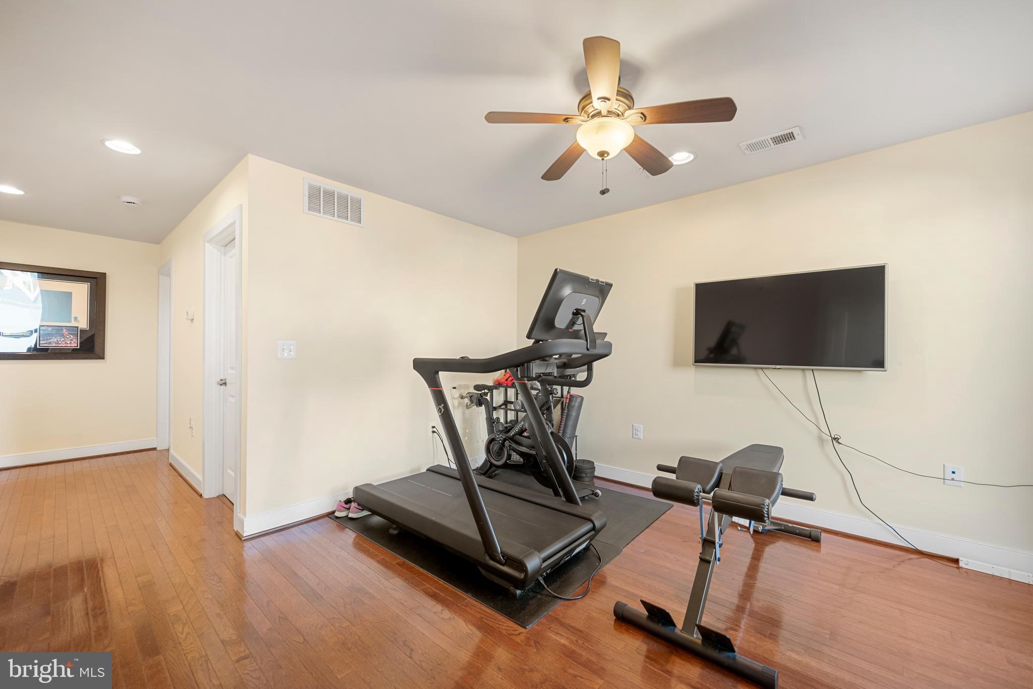 710 East Howell Avenue Alexandria, VA 22301 - Photo 23 of 43 a living room with furniture and a flat screen tv