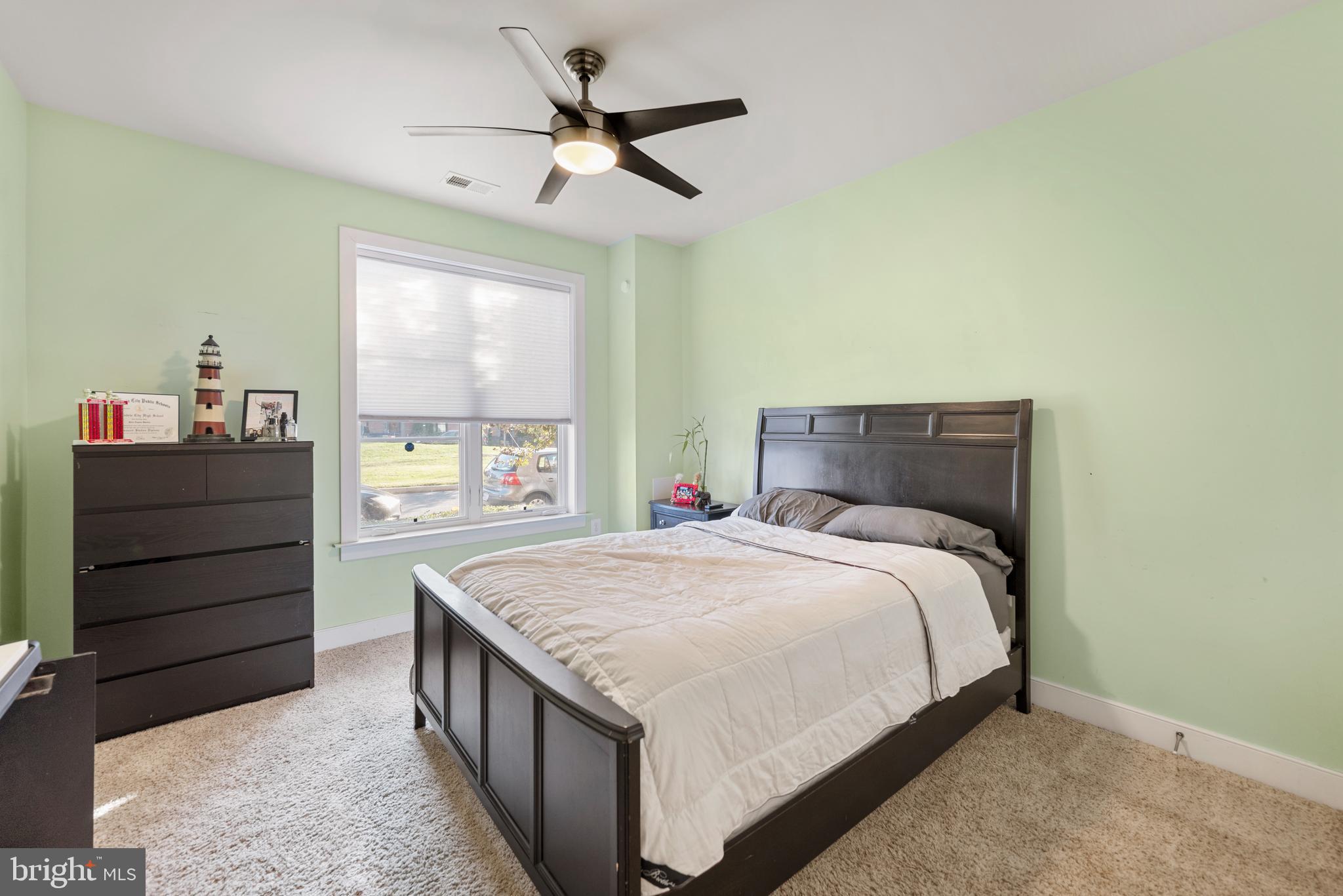 710 East Howell Avenue Alexandria, VA 22301 - Photo 34 of 43 a bedroom with a bed and a dresser