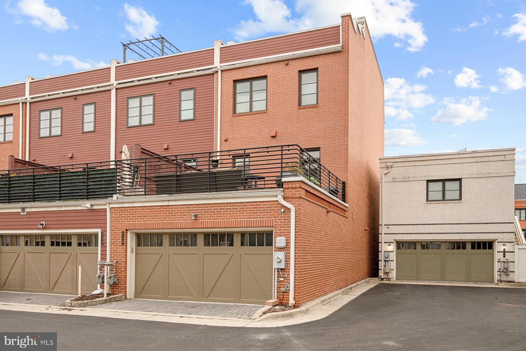 710 East Howell Avenue Alexandria, VA 22301 - Photo 39 of 43 a front view of a house with a garage
