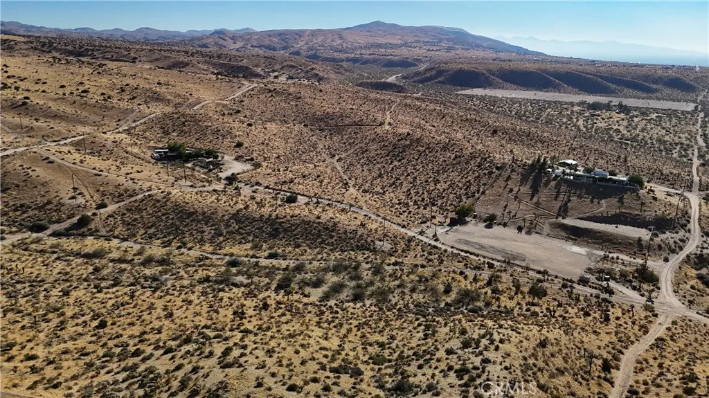 750 Ocotillo Way Apple Valley, CA 92308 - Photo 10 of 11 Red boundary lines on pictures are an estimate and for marketing purposes only. Buyer to verify all aspects of this property including, but not limited to utilities, assessments, boundaries, usage, access, and zoning to satisfy themselves.