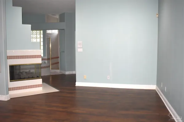 a bathroom with a sink a large mirror and a shower