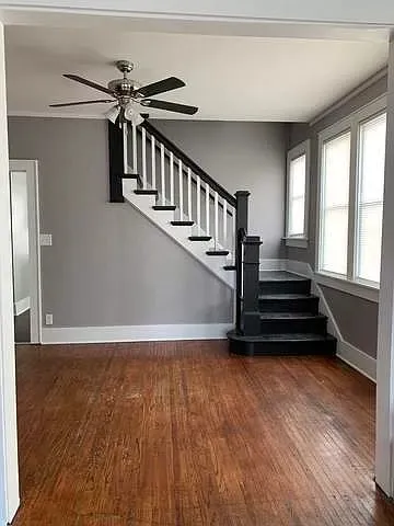 a view of entryway with wooden floor