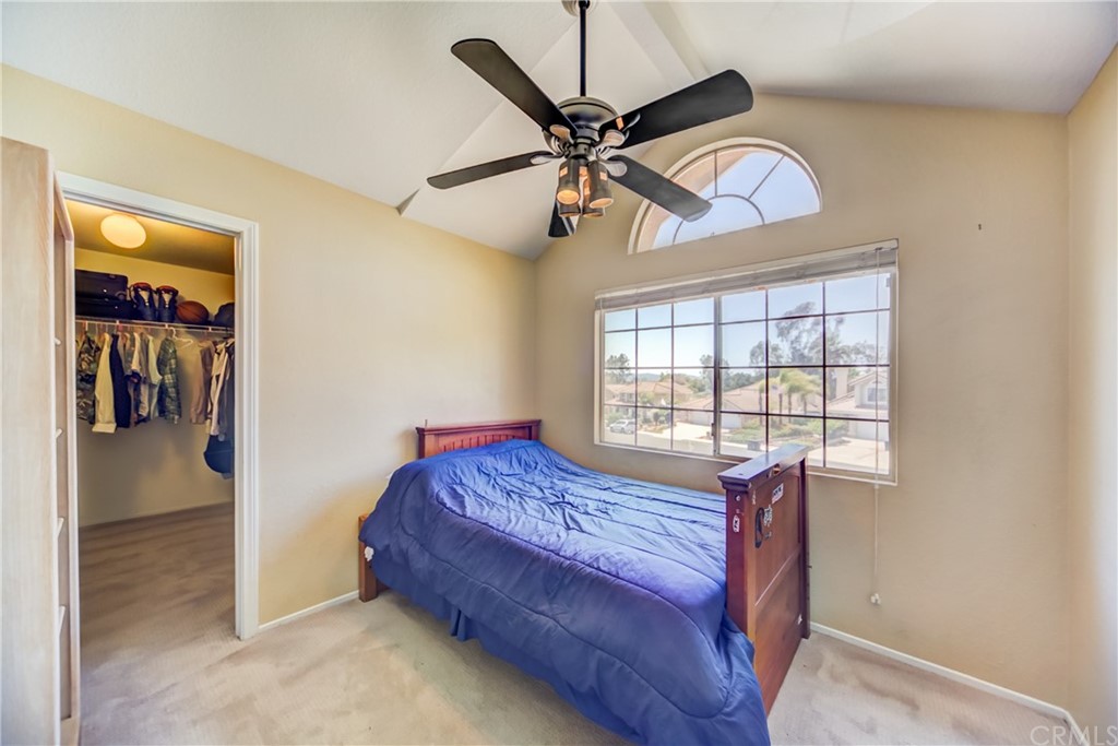 30219 Corte Cantera Temecula, CA 92591 - Photo 20 of 33 a bedroom with a bed and a window