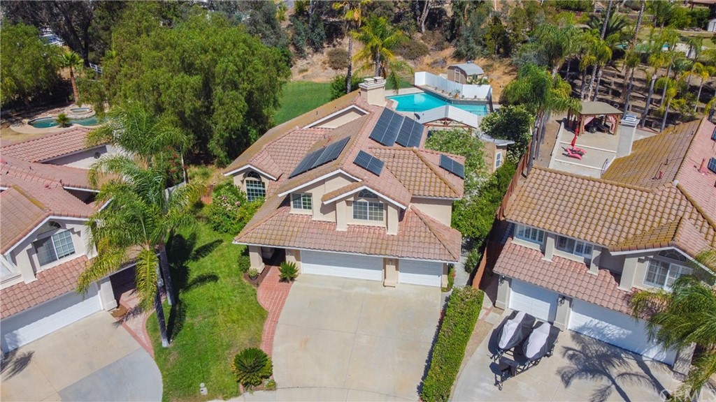 30219 Corte Cantera Temecula, CA 92591 - Photo 2 of 33 an aerial view of a house with a garden