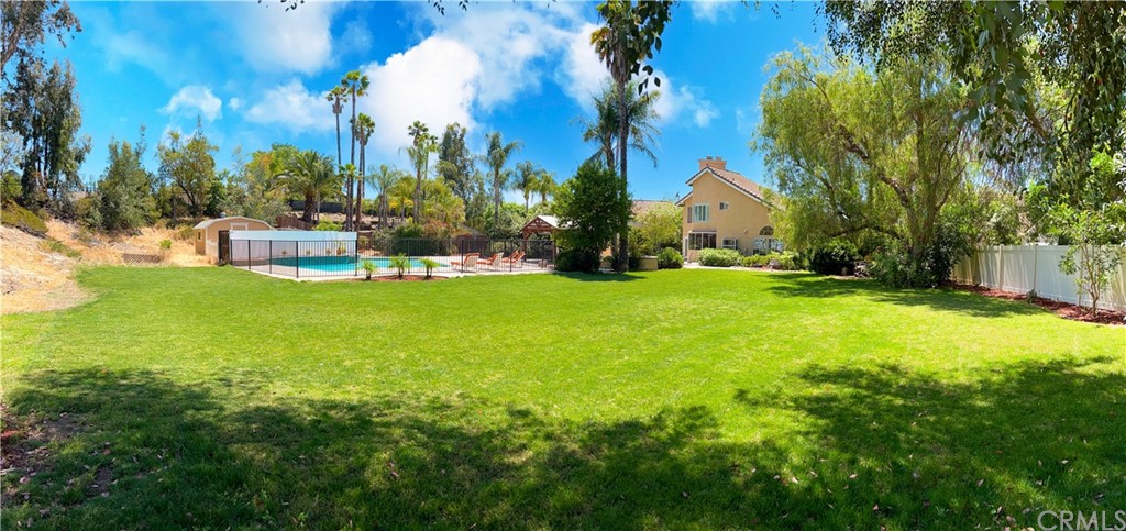 30219 Corte Cantera Temecula, CA 92591 - Photo 33 of 33 a view of a house with a yard and sitting area