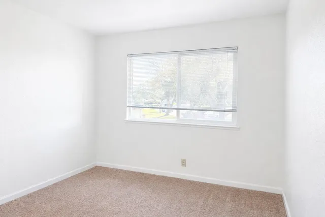 an empty room with a window