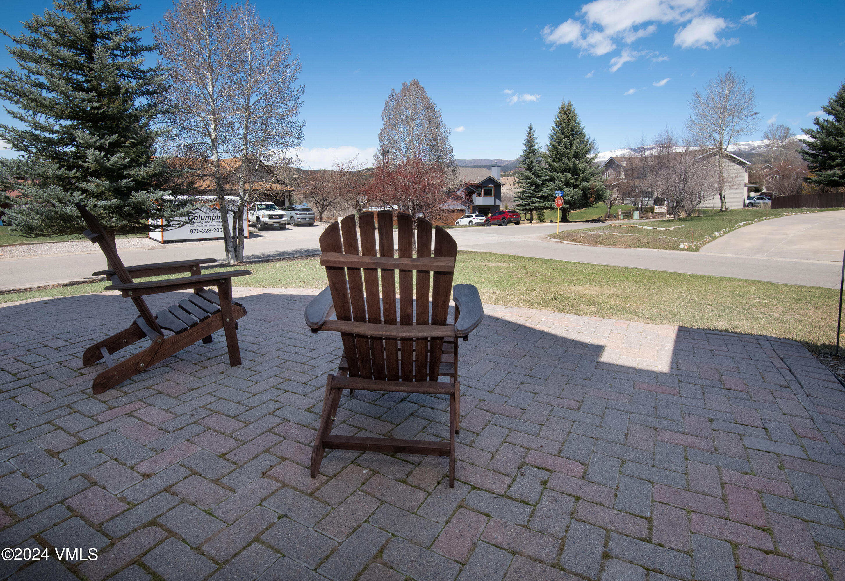 206 Golden Eagle Eagle, CO 81631 - Photo 12 of 47 a view of a swimming pool with a patio and a yard