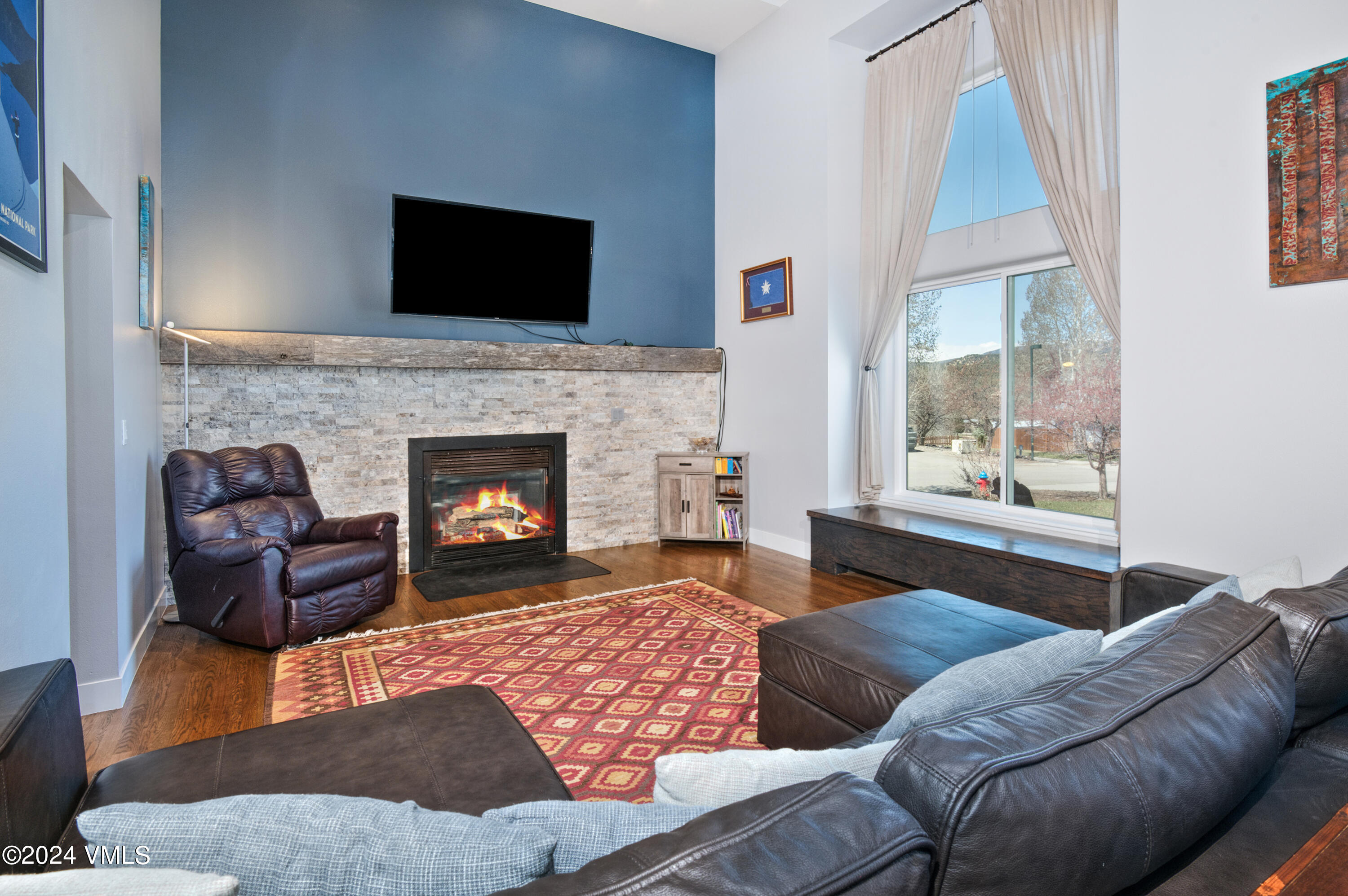 206 Golden Eagle Eagle, CO 81631 - Photo 17 of 47 a living room with furniture and a fireplace