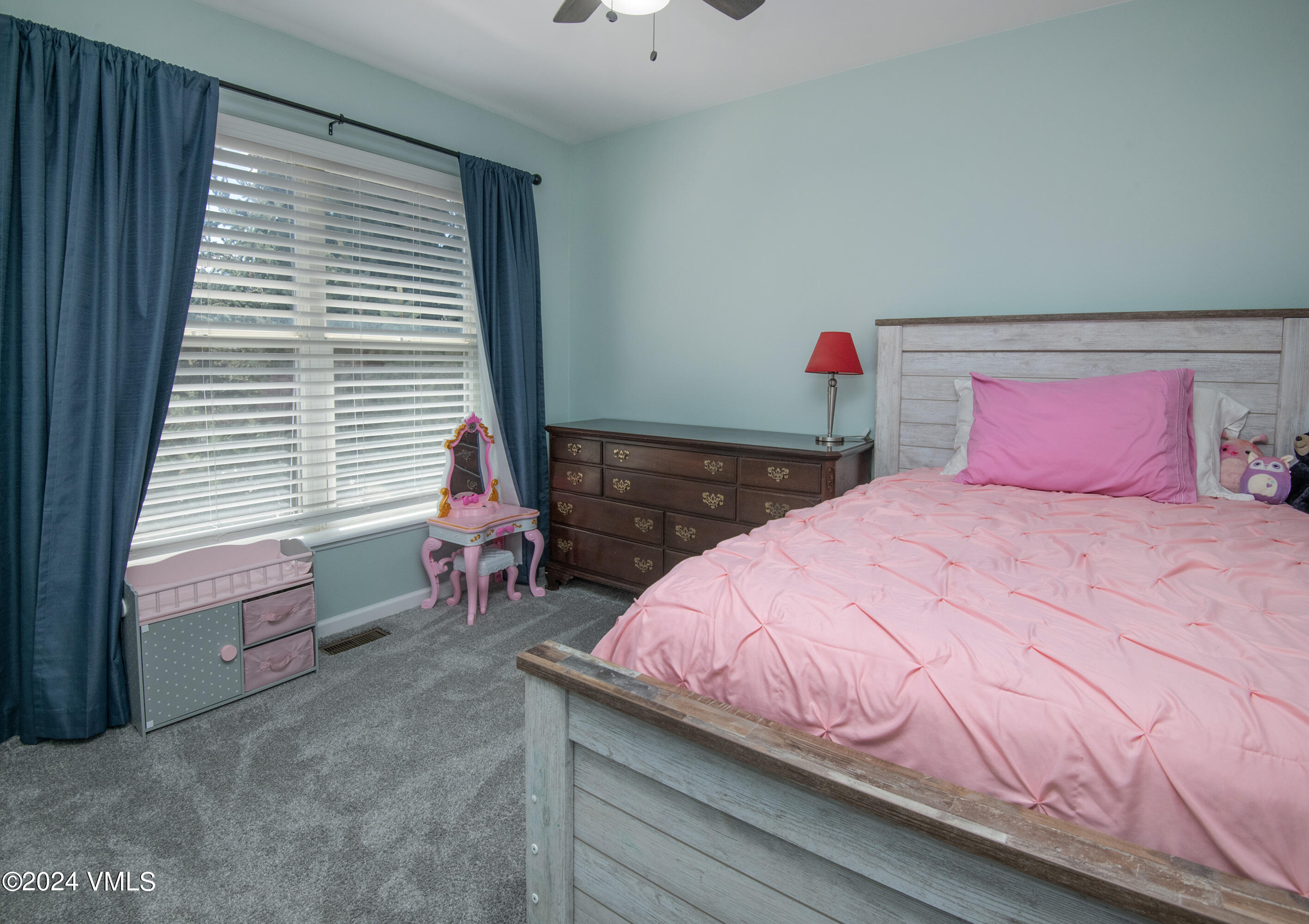 206 Golden Eagle Eagle, CO 81631 - Photo 20 of 47 a bedroom with a bed and a window