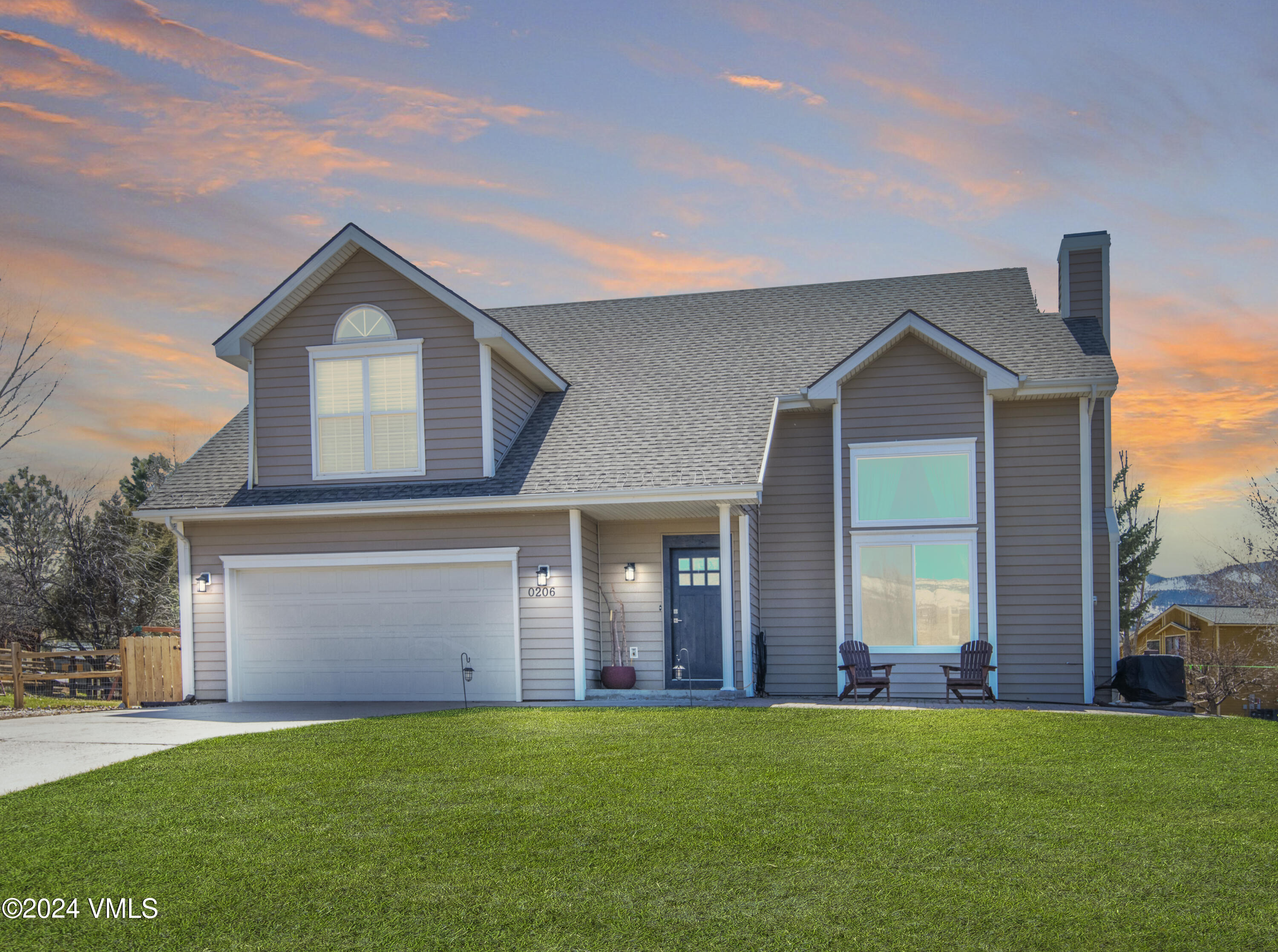 206 Golden Eagle Eagle, CO 81631 - Photo 2 of 47 front view of the house with a yard
