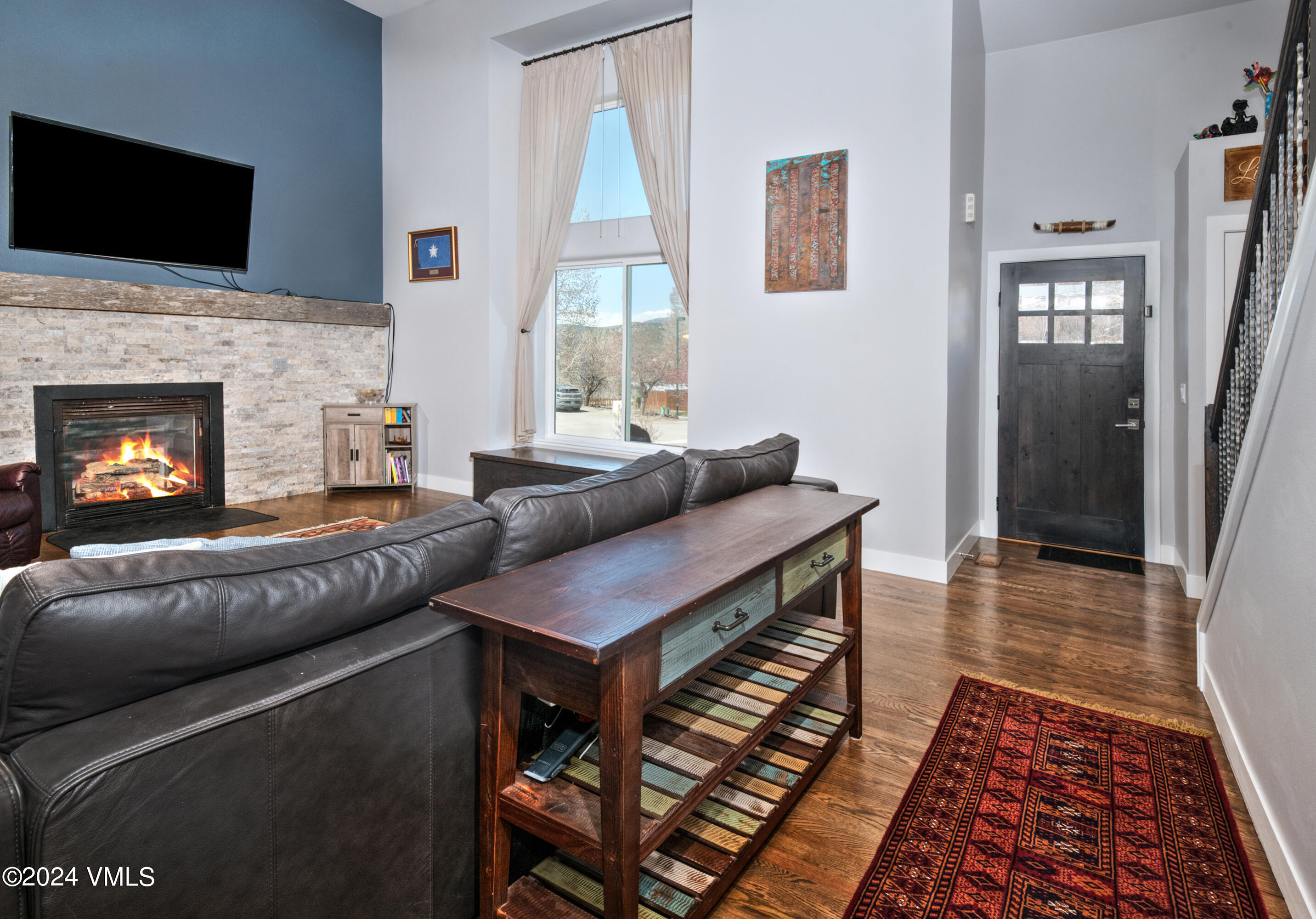 206 Golden Eagle Eagle, CO 81631 - Photo 26 of 47 a living room with furniture and a fireplace