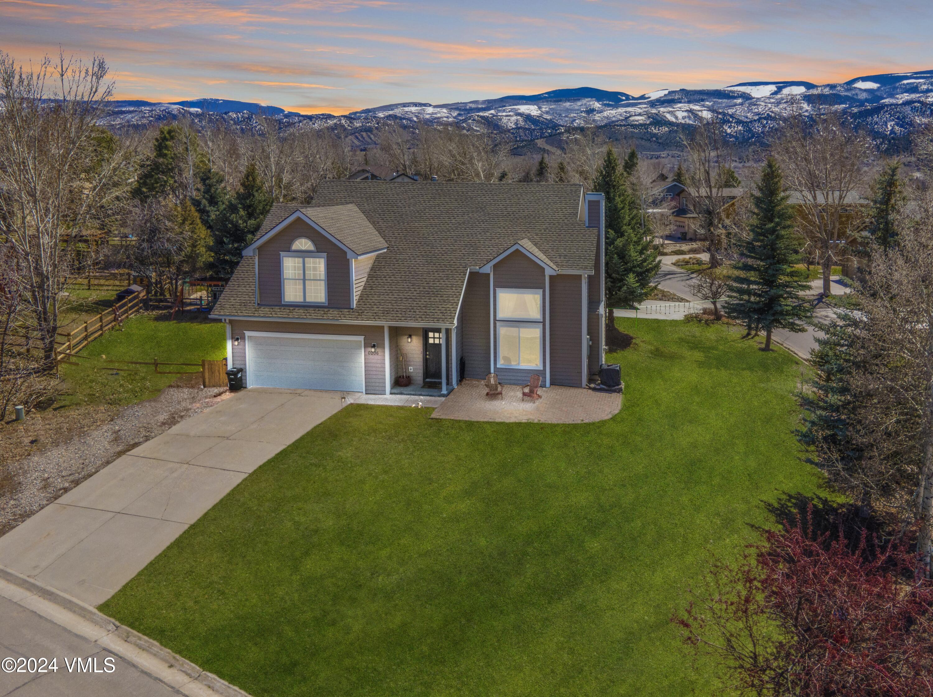 206 Golden Eagle Eagle, CO 81631 - Photo 3 of 47 front view of a house with a yard
