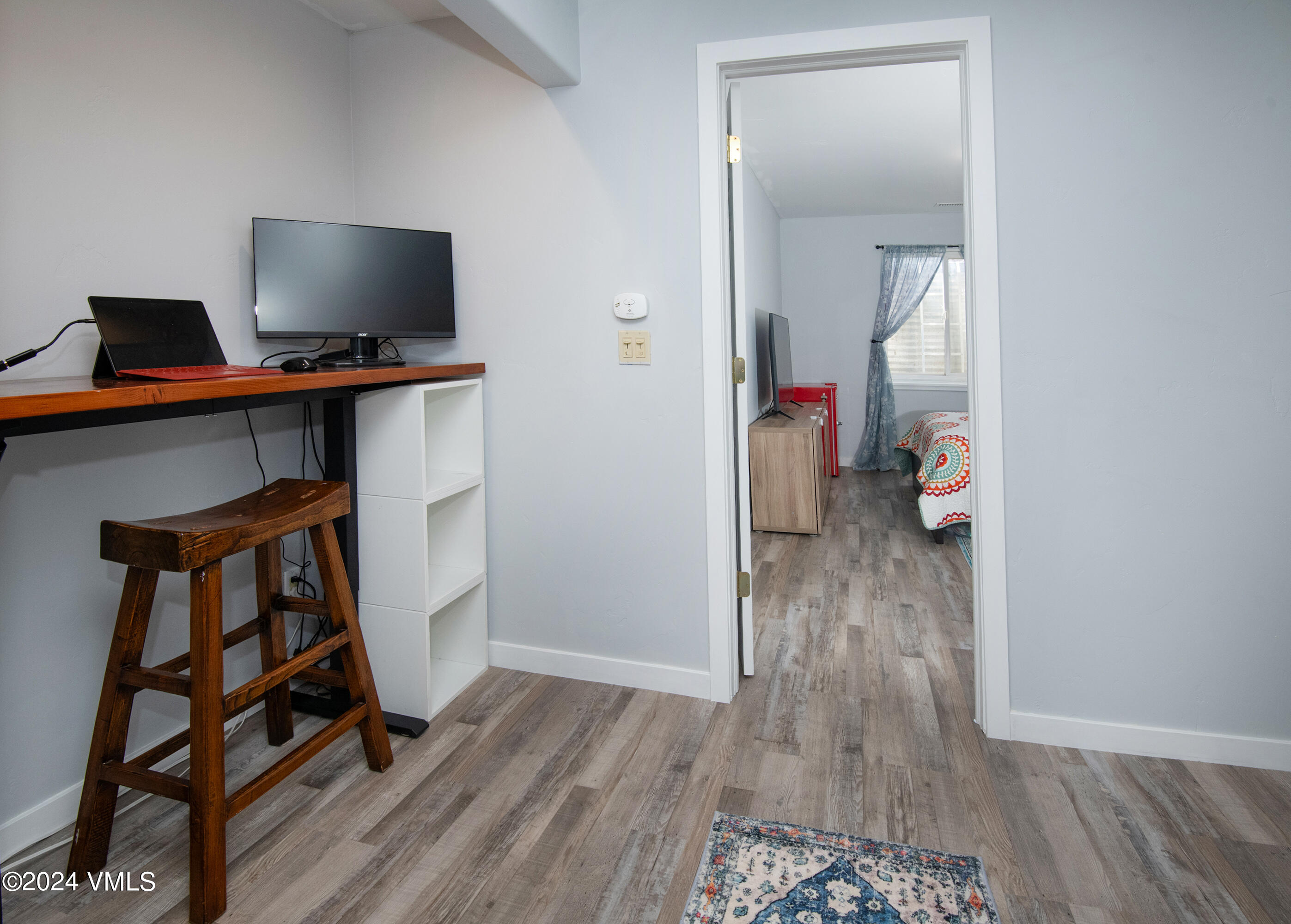 206 Golden Eagle Eagle, CO 81631 - Photo 34 of 47 a view of a bedroom with wooden floor and closet