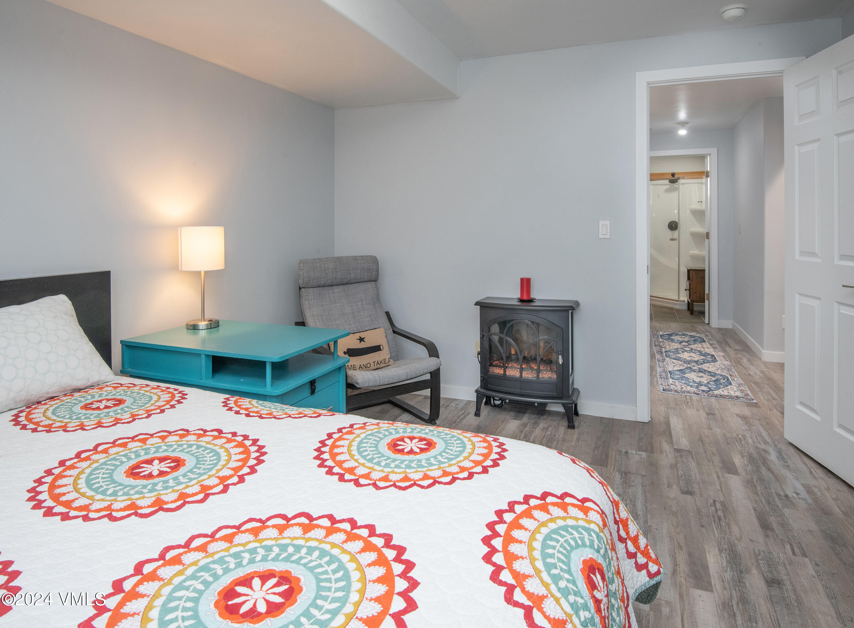 206 Golden Eagle Eagle, CO 81631 - Photo 36 of 47 a bedroom with a bed and a table in it