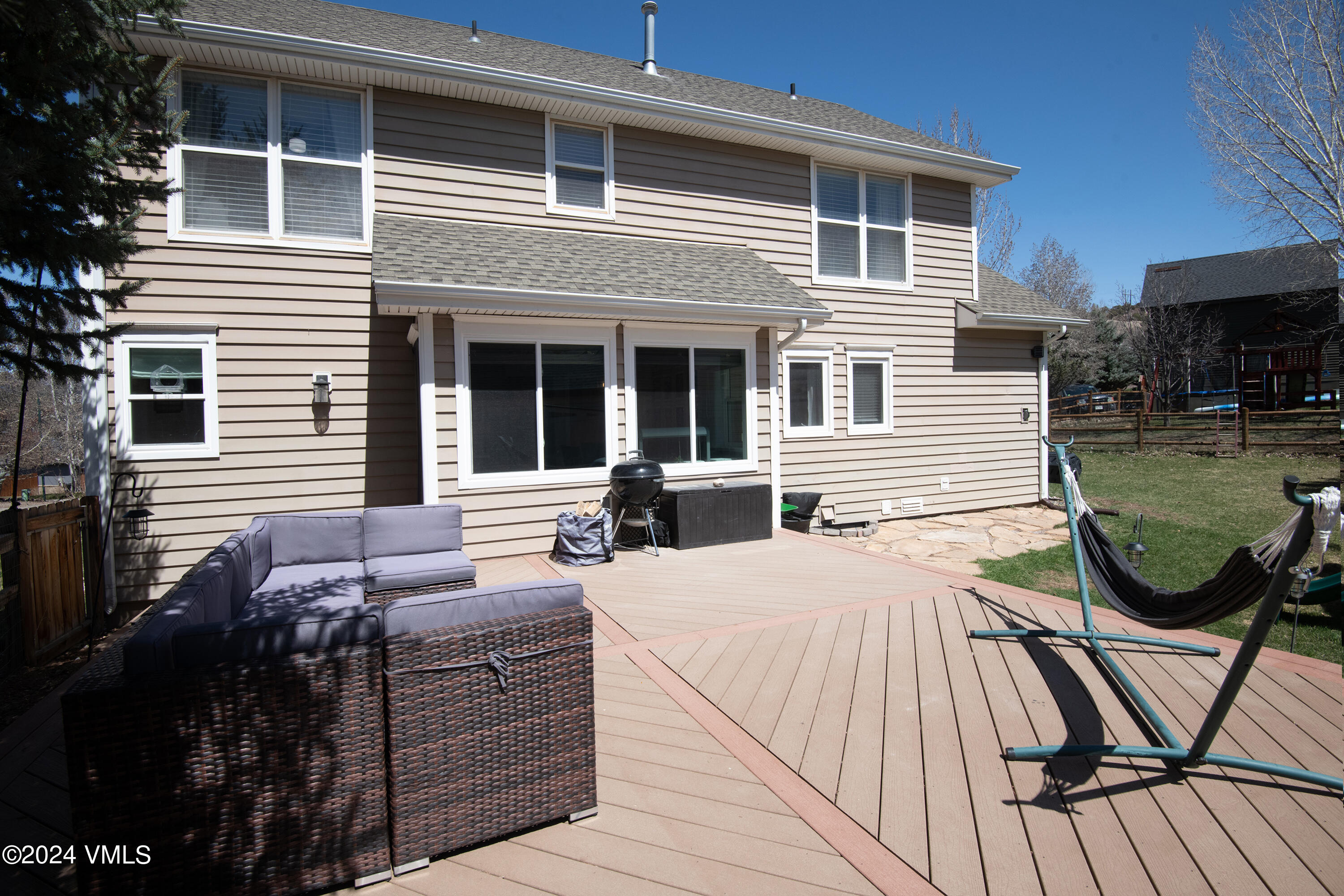 206 Golden Eagle Eagle, CO 81631 - Photo 40 of 47 a view of a house with backyard and sitting area