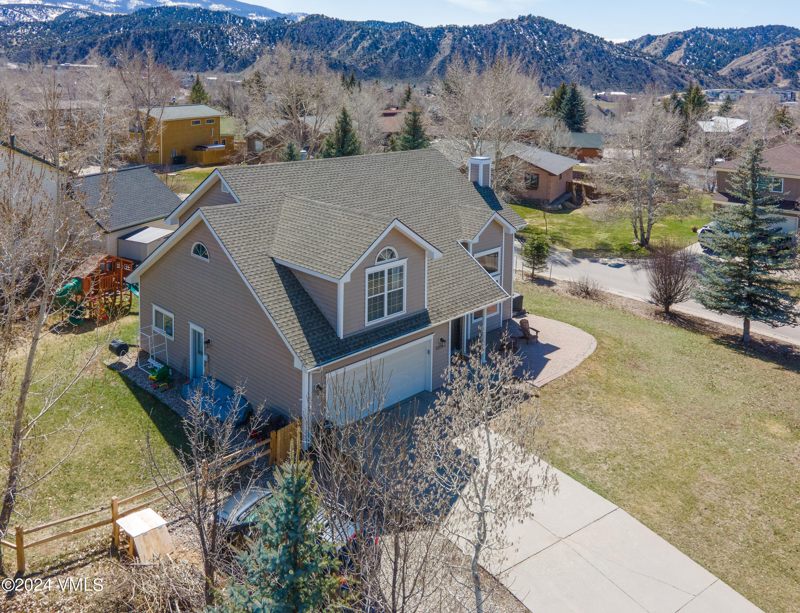 206 Golden Eagle Eagle, CO 81631 - Photo 4 of 47 an aerial view of a house with a mountain