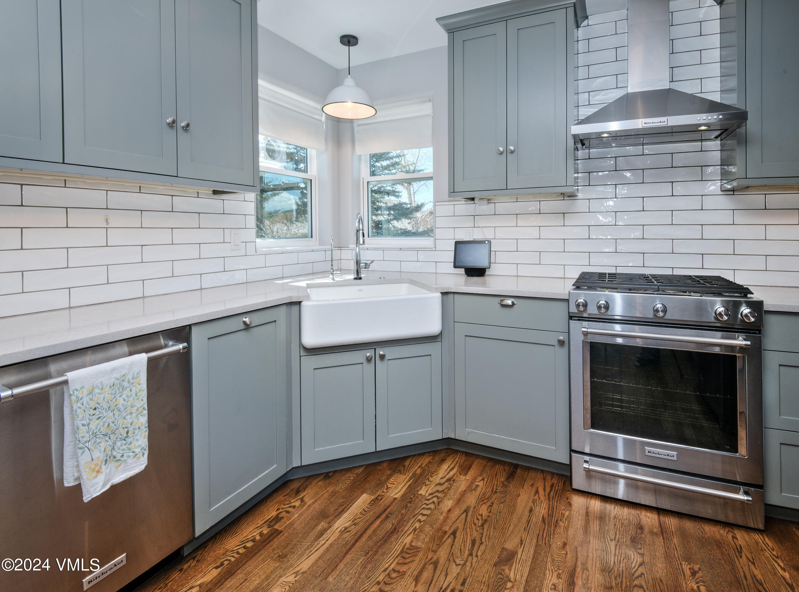 206 Golden Eagle Eagle, CO 81631 - Photo 6 of 47 a kitchen with a sink stove and cabinets