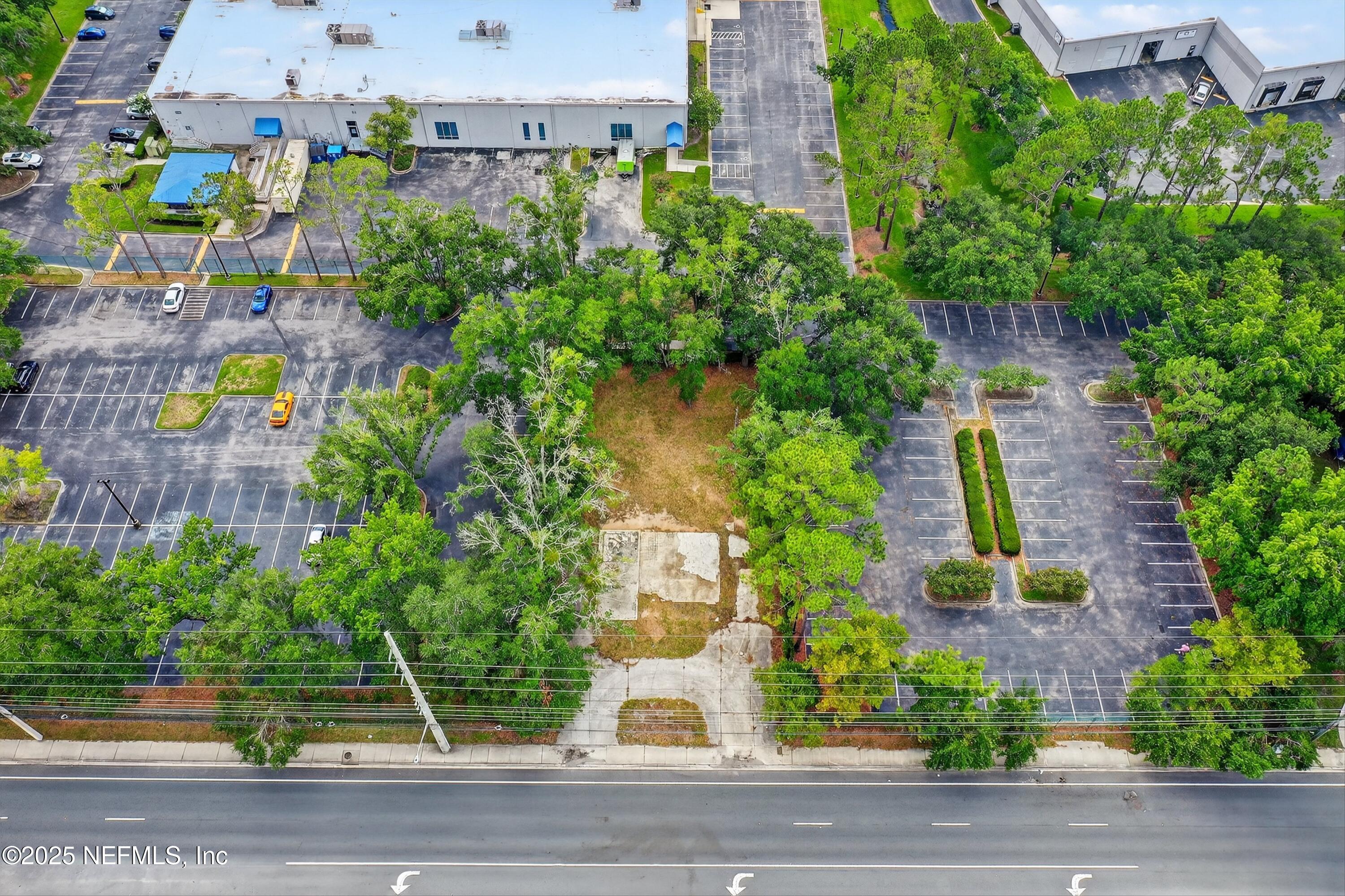 6346 Collins Road Jacksonville, FL 32244 - Photo 8 of 17 an aerial view of a house