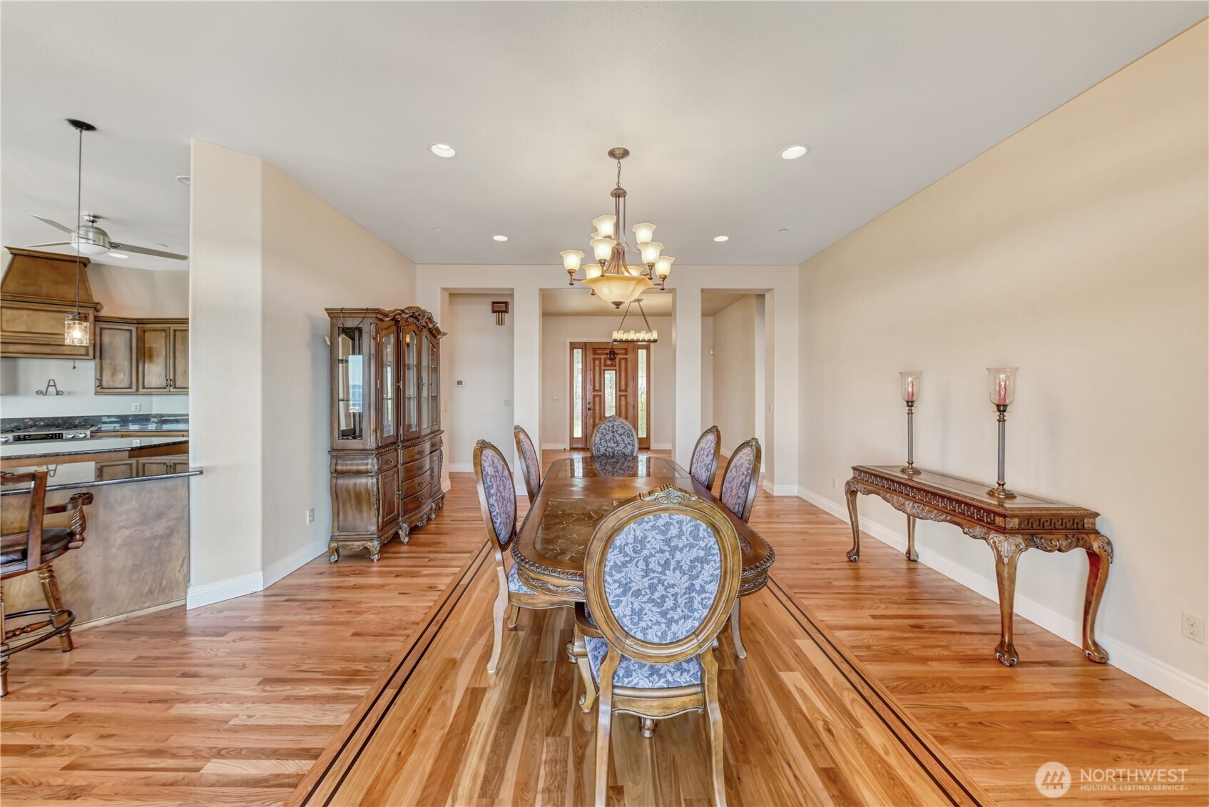 254 Caseco Lane Port Orchard, WA 98366 - Photo 8 of 28 a very nice looking dining room with furniture a rug and wooden floor
