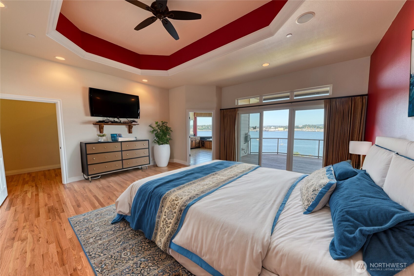 254 Caseco Lane Port Orchard, WA 98366 - Photo 9 of 28 a bedroom with a bed and a flat screen tv