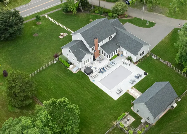an aerial view of a house with a garden