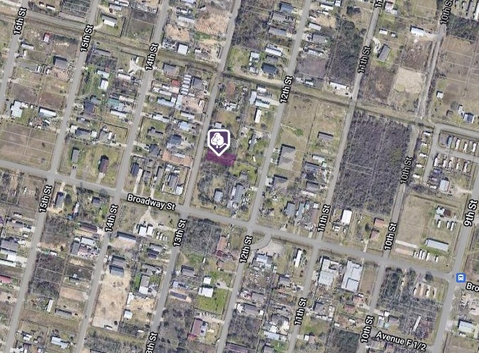 525 13th Street Dickinson, TX 77539 - Photo 3 of 3 a sign board next to a building