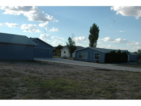 3520 North Reed Road Chino Valley, AZ 86323 - Photo 4 of 7 a view of a backyard of a house