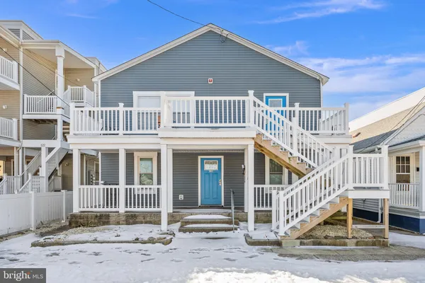 a front view of a house with a porch