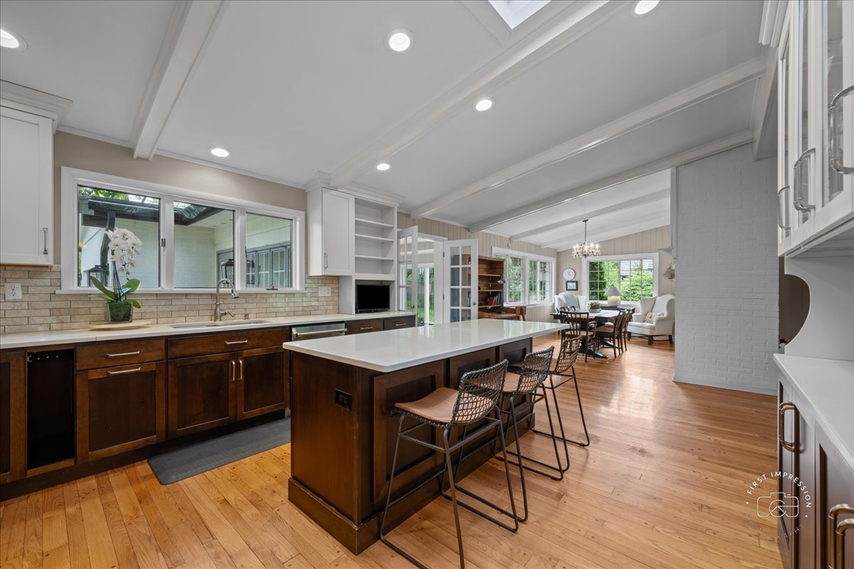 705 Meadows Road Geneva, IL 60134 - Photo 7 of 27 a kitchen with a table and chairs in it