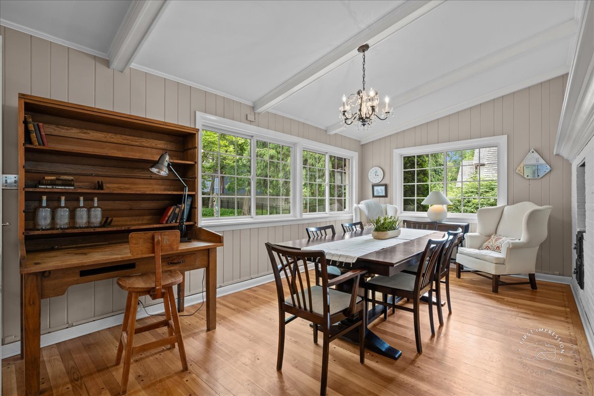 705 Meadows Road Geneva, IL 60134 - Photo 8 of 27 a view of a dining room with furniture window and outside view