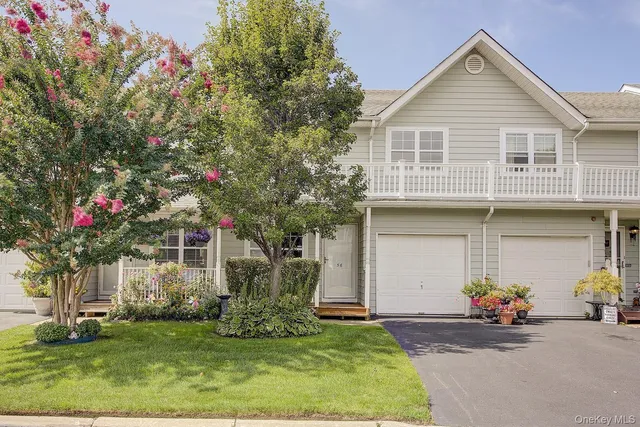 a view of a house with garage