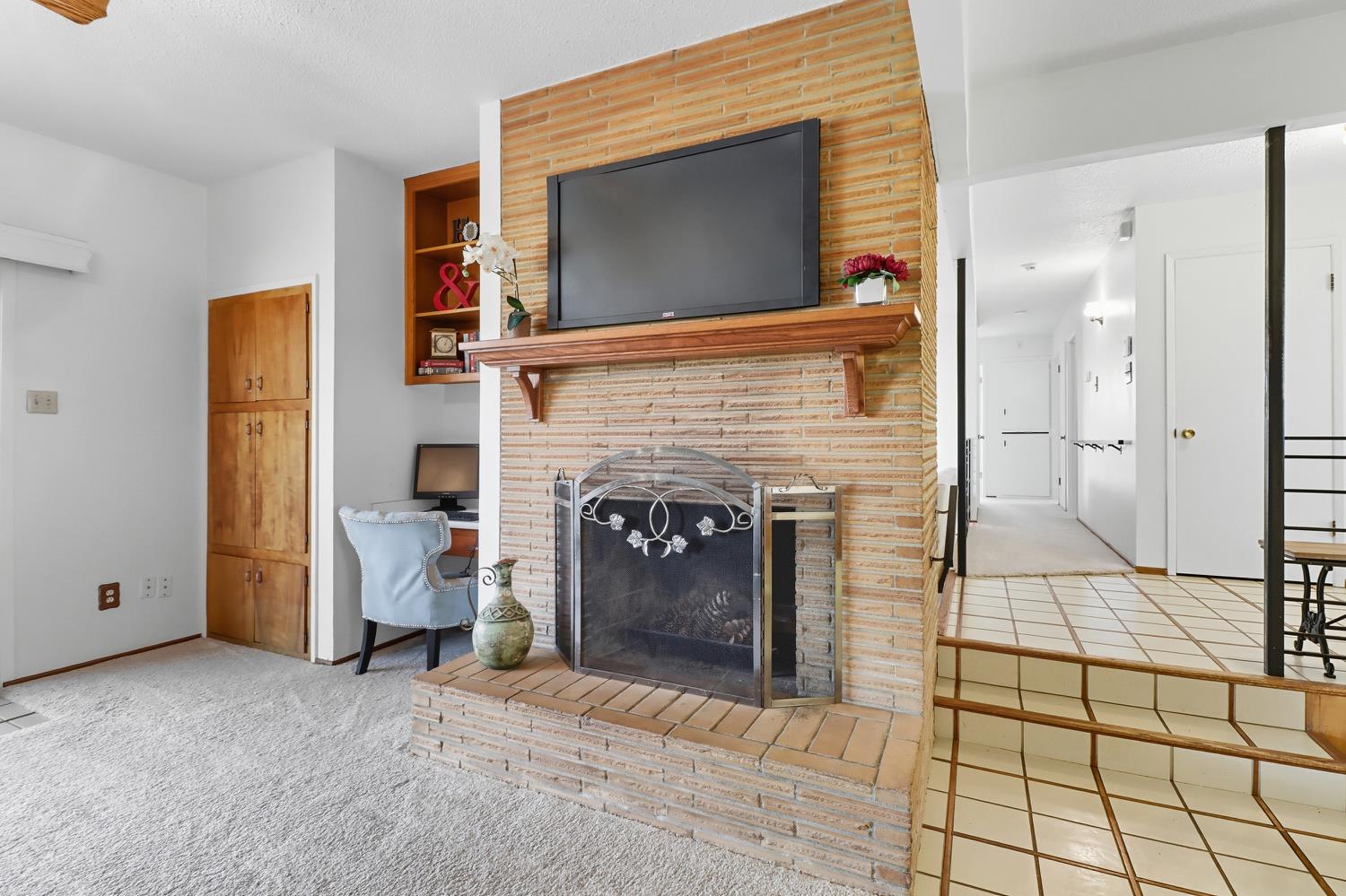 3366 Point Pleasant Road Elk Grove, CA 95757 - Photo 13 of 60 a view of a livingroom with a fireplace and window