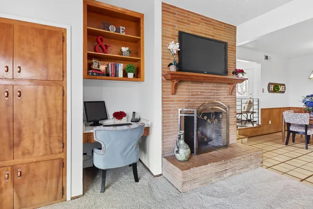 a kitchen with stainless steel appliances granite countertop a refrigerator and stove